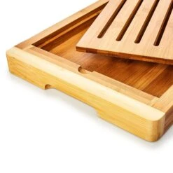Brotschneidebrett Mit Krümelfach Bambus 38 X 3 X 25,5 Cm (BxHxT) Recycelbar -Klarstein Verkaufsgeschäft 10038056 yy 0003 logo