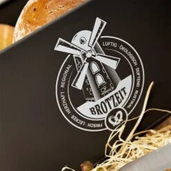 Stigby 2-in-1 Brotkasten Mit Schneidebrett Metallblech Bambus 12 Stigby 2-in-1 Brotkasten Mit Schneidebrett Metallblech Bambus -Klarstein Verkaufsgeschäft 10038084 yy 0004 logo