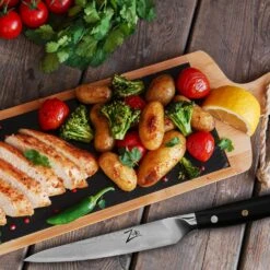 Alpha-Royal Japanese Serie 6" Allzweckmesser Damaszener-Stahl 67-lagig -Klarstein Verkaufsgeschäft 10038998 de 0003 logo